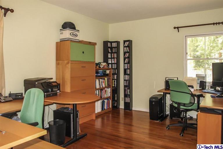1963 New York Drive Altadena, CA 91001 - Photo 12 of 38 a workspace with furniture and wooden floor