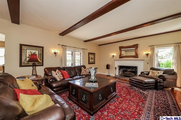 1963 New York Drive Altadena, CA 91001 - Photo 3 of 38 a living room with furniture fireplace and a flat screen tv