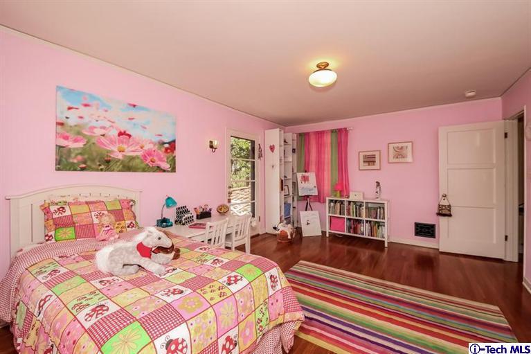 1963 New York Drive Altadena, CA 91001 - Photo 21 of 38 a bedroom with a bed and a couch