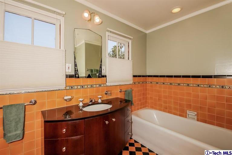 1963 New York Drive Altadena, CA 91001 - Photo 23 of 38 a bathroom with a sink and a bathtub