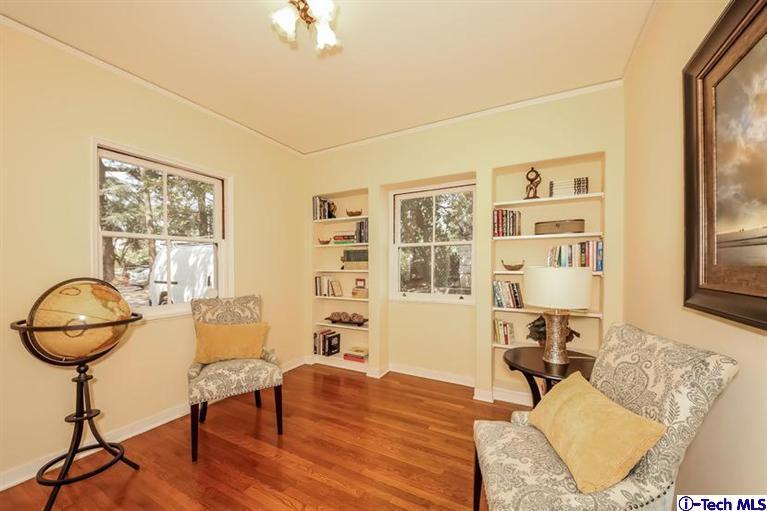 1963 New York Drive Altadena, CA 91001 - Photo 25 of 38 a living room with furniture a dining table and wooden floor