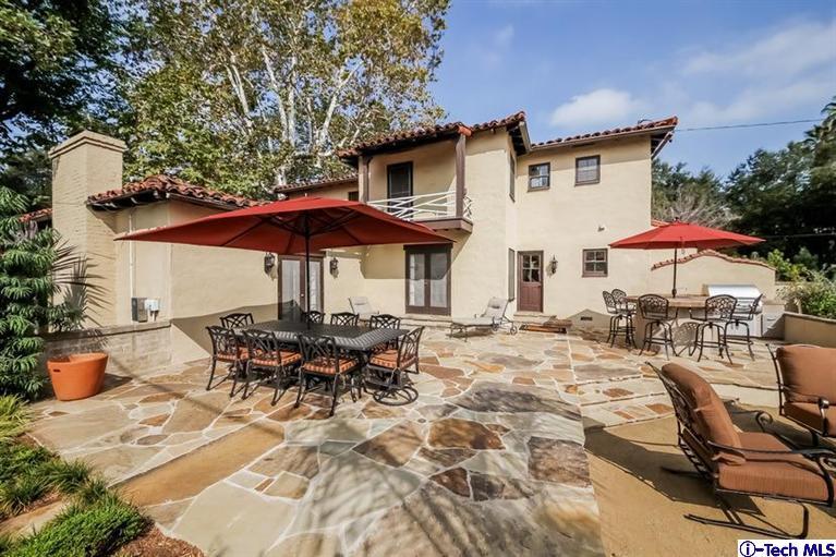 1963 New York Drive Altadena, CA 91001 - Photo 27 of 38 a view of a patio with chairs and umbrellas