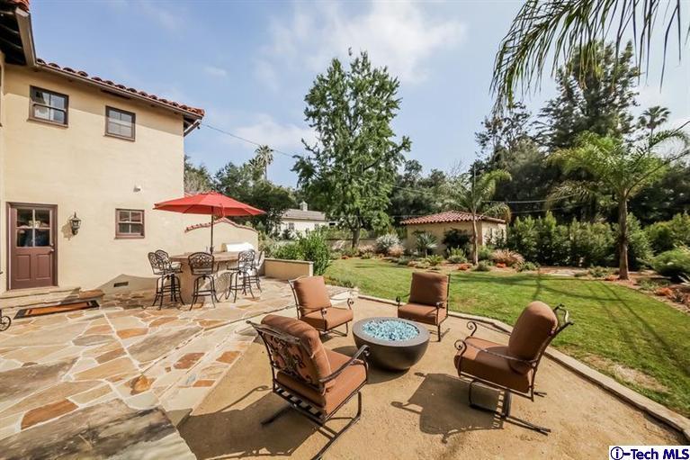 1963 New York Drive Altadena, CA 91001 - Photo 30 of 38 a swimming pool with outdoor seating and yard