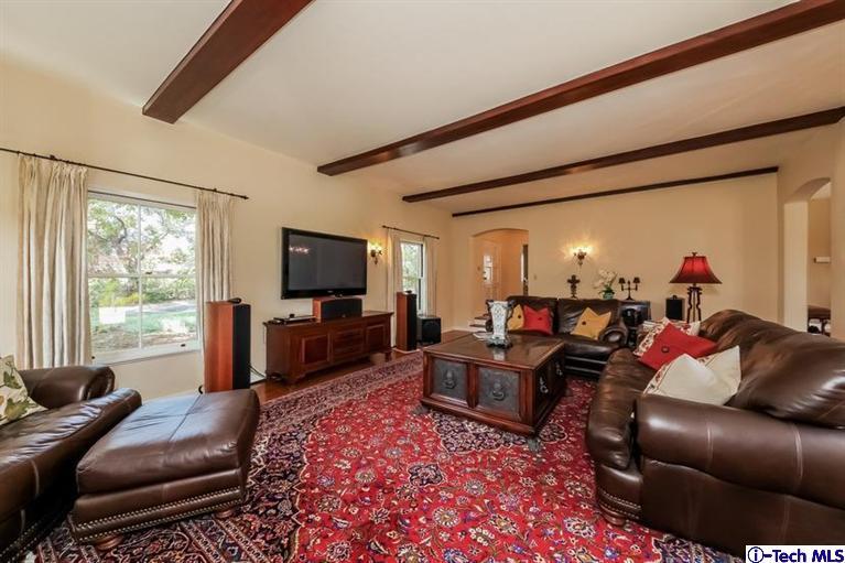 1963 New York Drive Altadena, CA 91001 - Photo 4 of 38 a living room with furniture and a flat screen tv