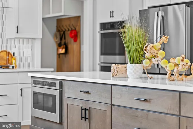 a view of cabinets and window