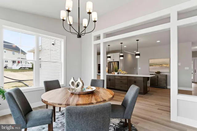 a bedroom with bed and a potted plant