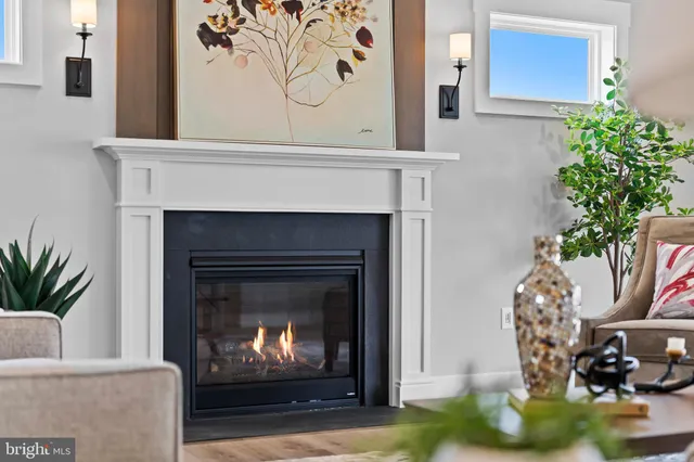 a bathroom with a double vanity sink mirror and shower