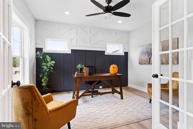 a workspace with furniture and window