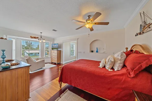 a bathroom with a sink a mirror and a shower