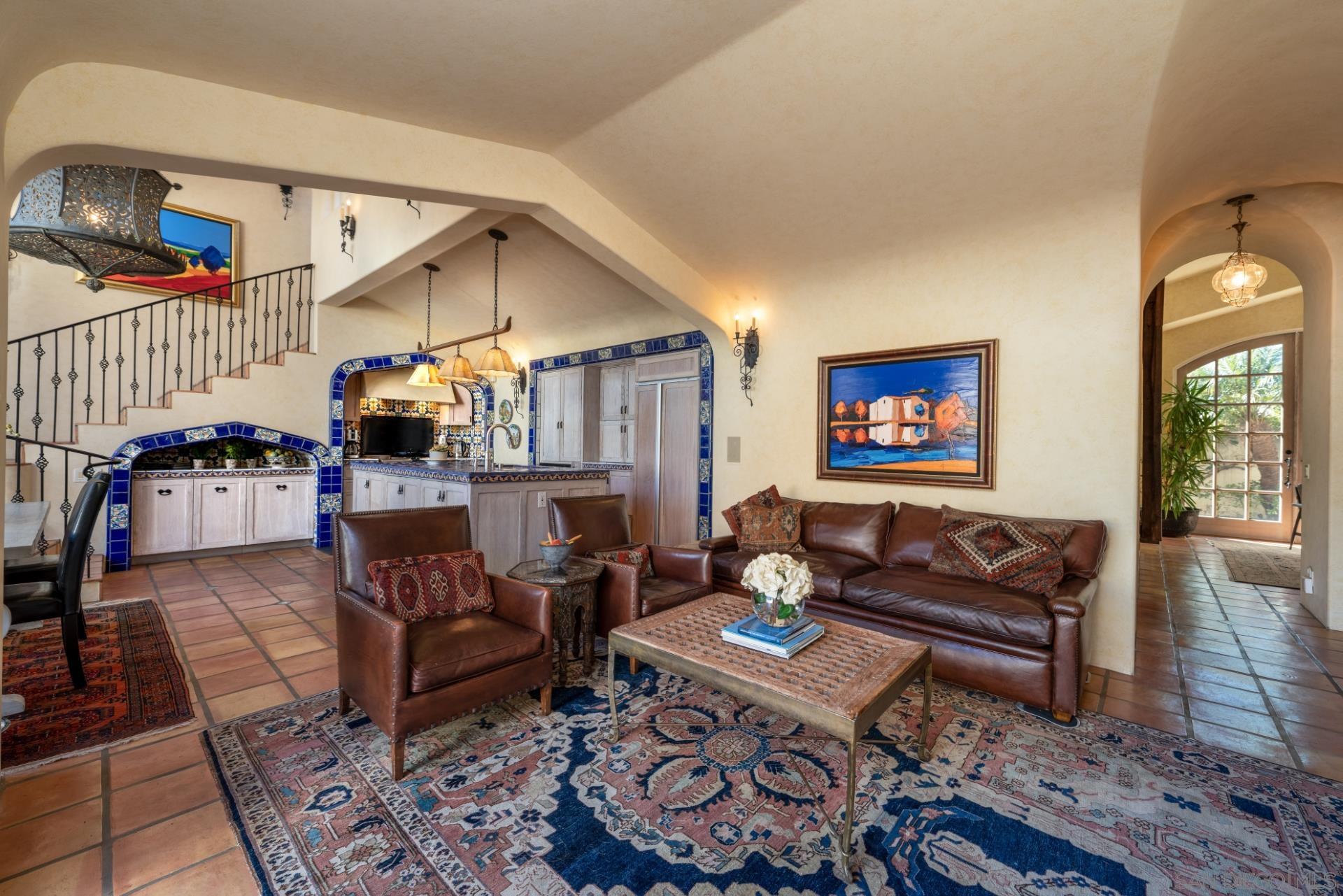 6174 El Tordo Rancho Santa Fe, CA 92067 - Photo 19 of 58 a living room with furniture and a flat screen tv