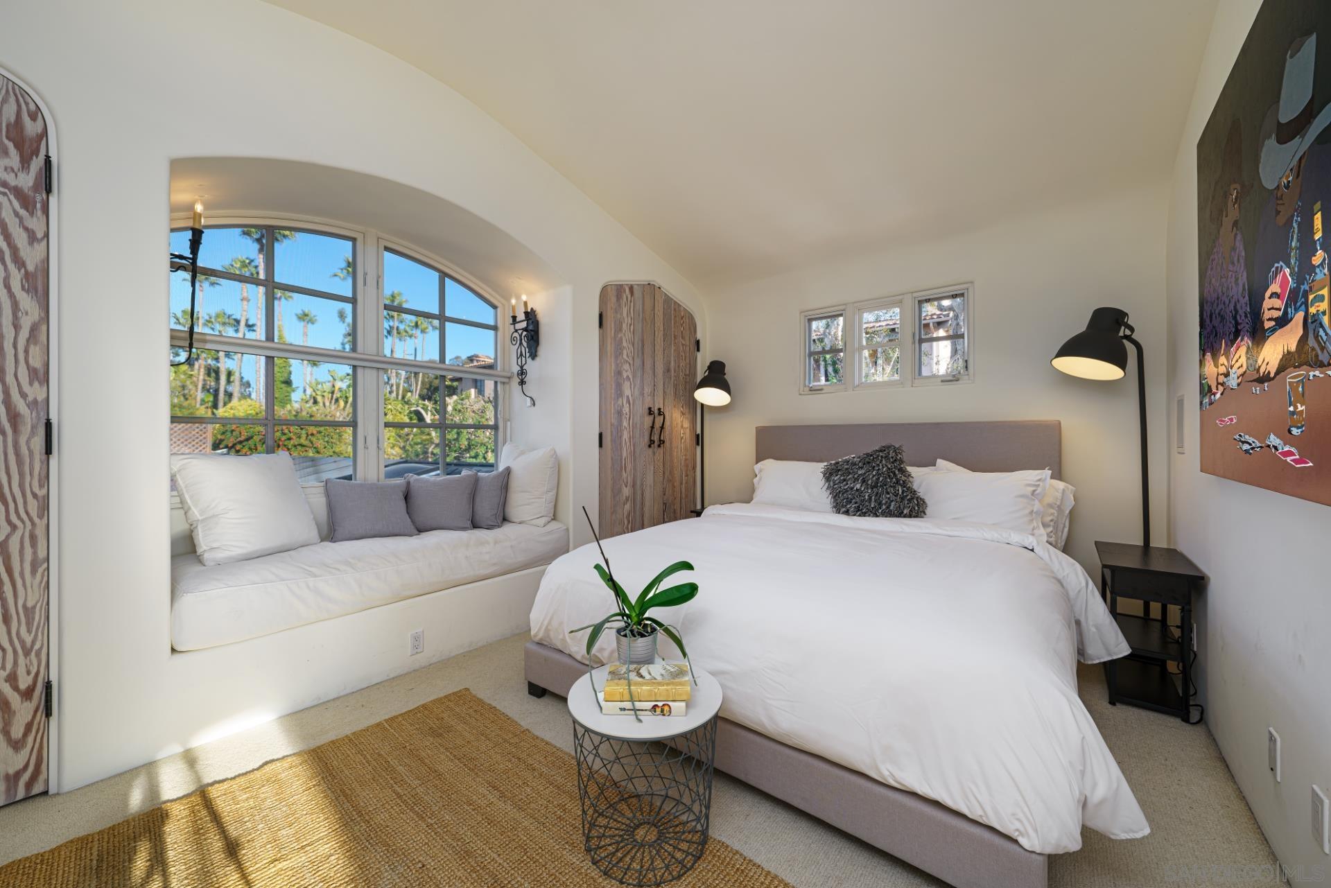 6174 El Tordo Rancho Santa Fe, CA 92067 - Photo 40 of 58 a bedroom with a bed and a couch