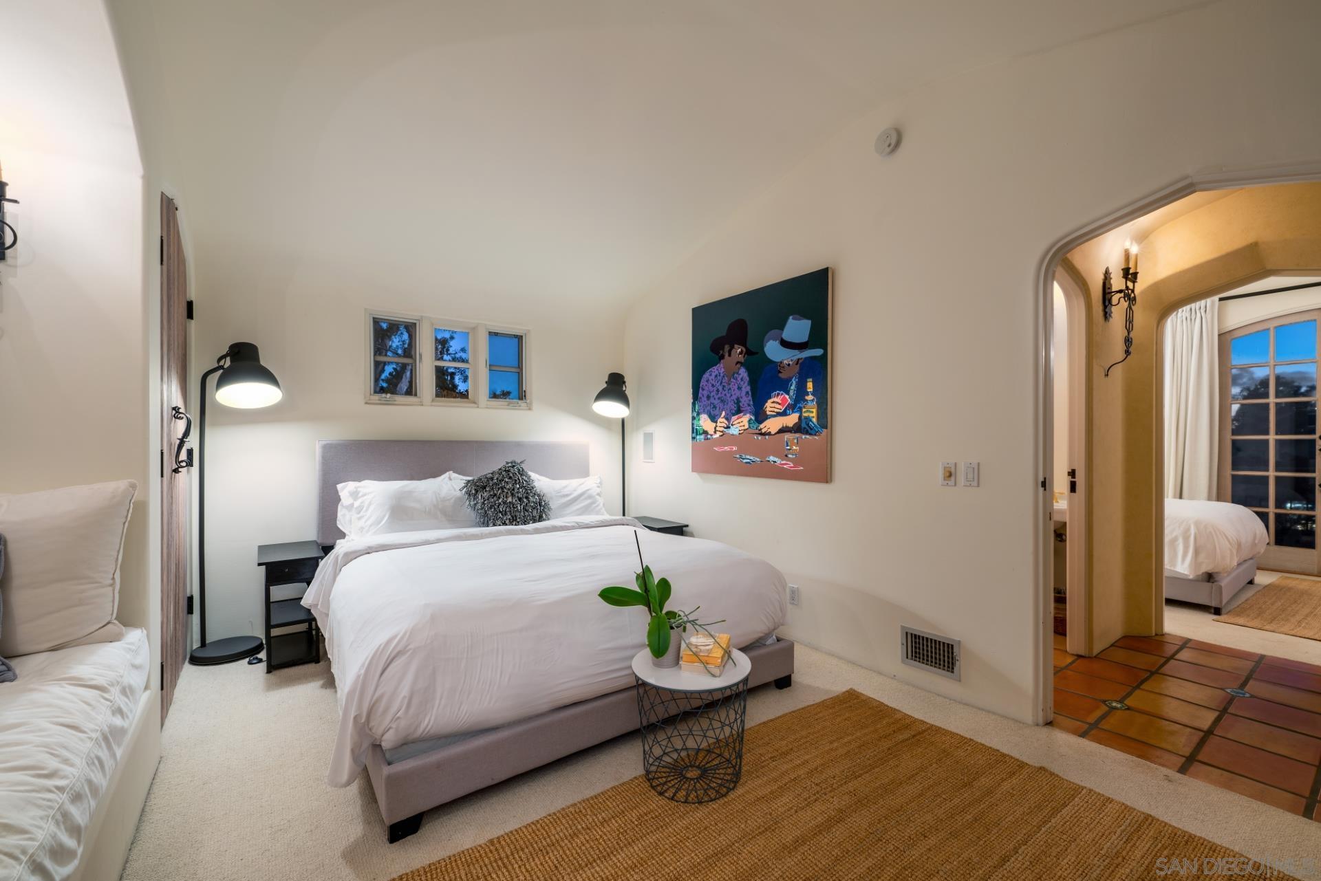 6174 El Tordo Rancho Santa Fe, CA 92067 - Photo 42 of 58 a bedroom with a bed and wooden floor