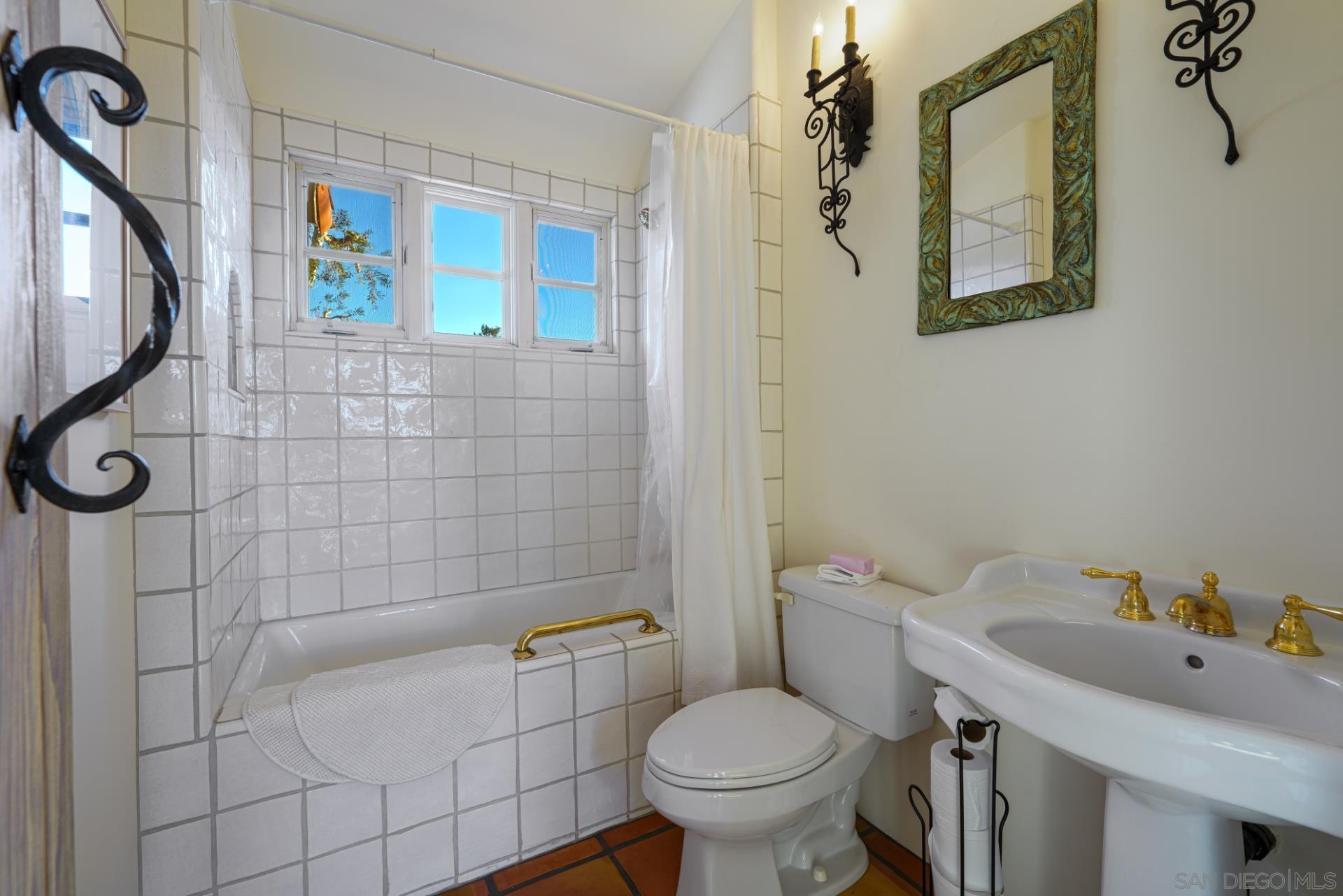 6174 El Tordo Rancho Santa Fe, CA 92067 - Photo 43 of 58 a bathroom with a sink toilet and shower