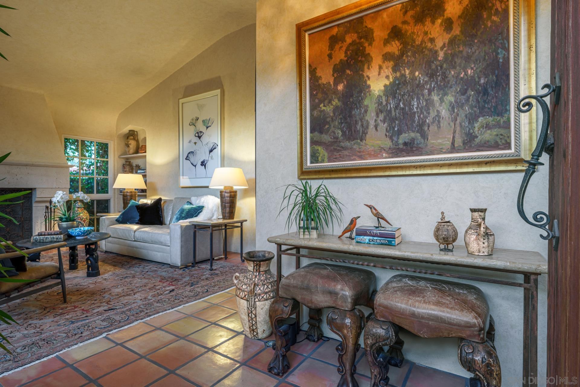 6174 El Tordo Rancho Santa Fe, CA 92067 - Photo 7 of 58 a living room with furniture and a painting on the wall
