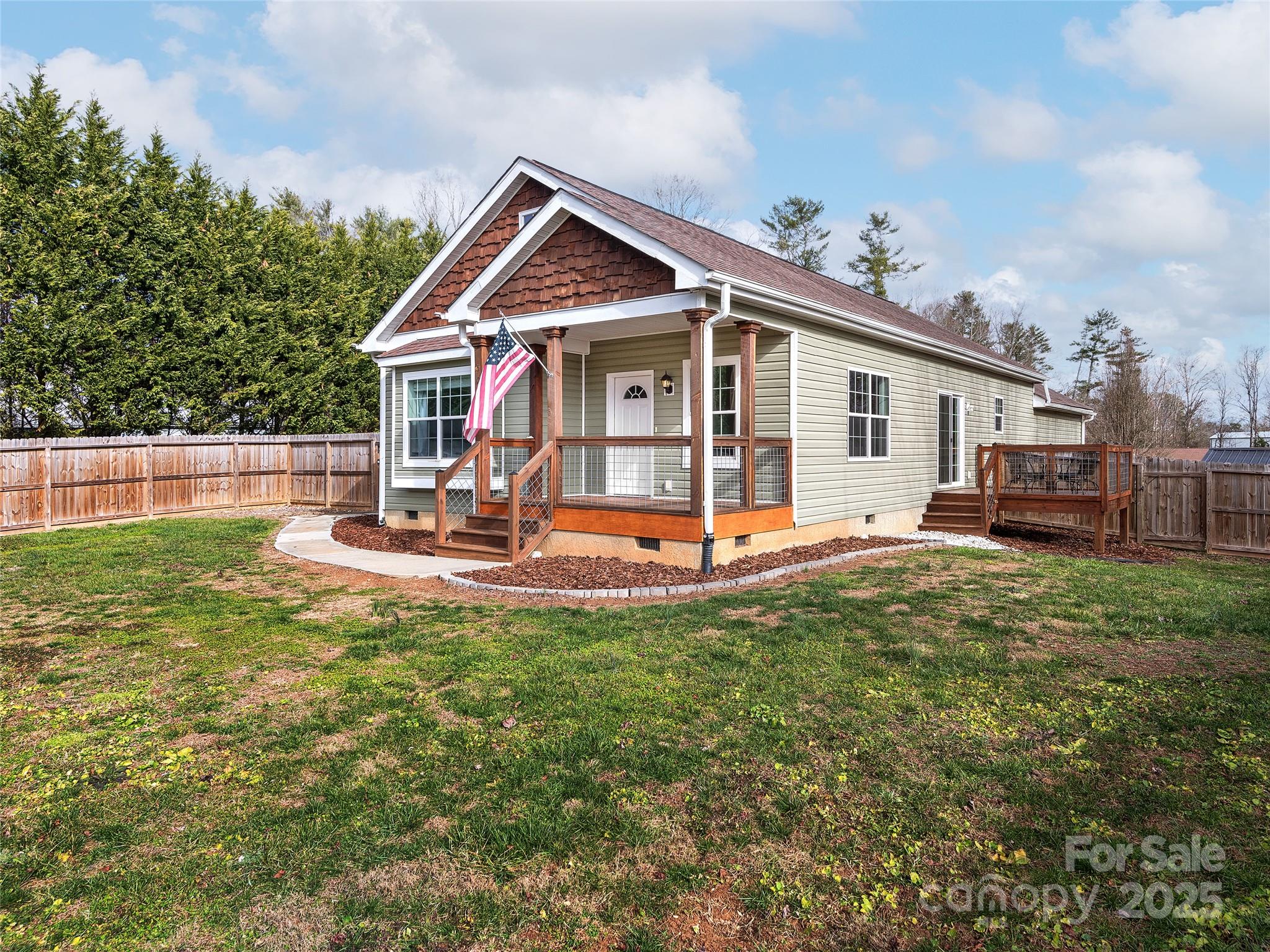 508 Fanning Bridge Road Fletcher, NC 28732 - Photo 2 of 21 a view of a house with a yard porch and sitting area