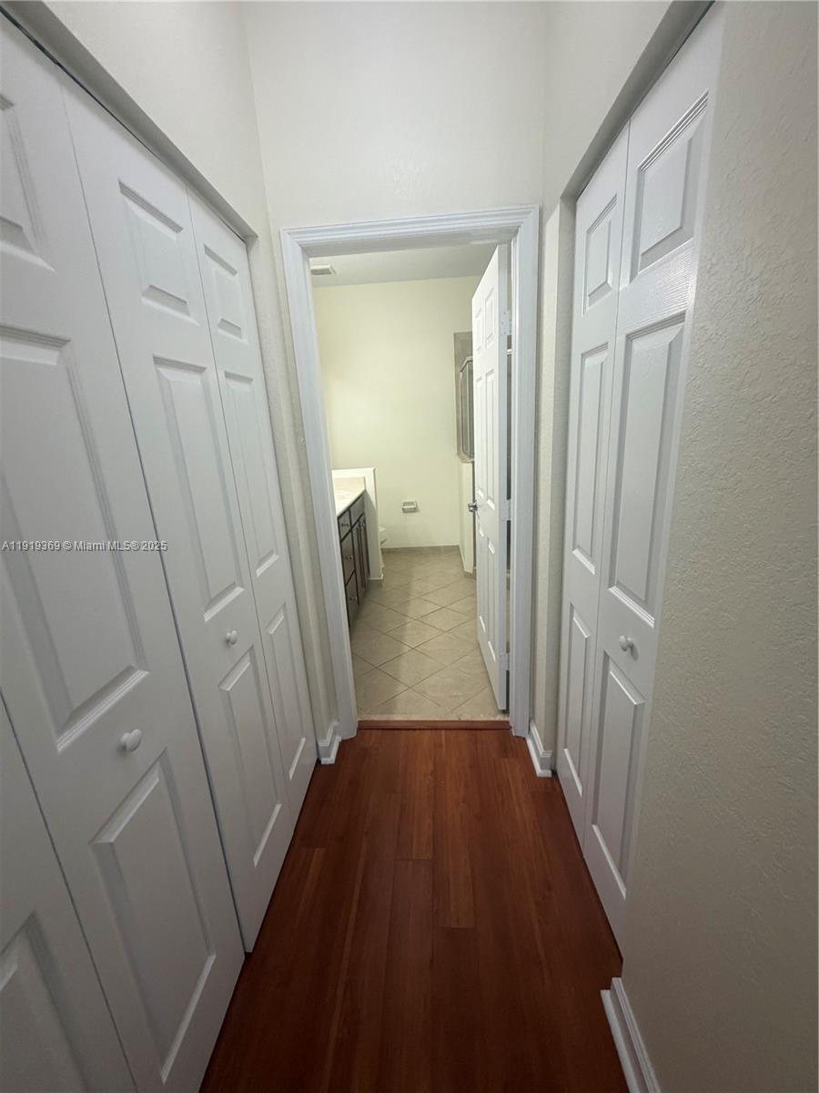 11347 Southwest 232nd Terrace Homestead, FL 33032 - Photo 13 of 26 a view of a room with a wardrobe