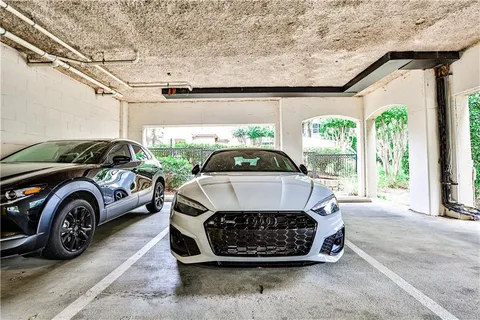 a car parked in front of a house