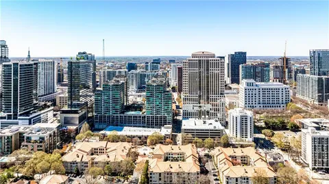 a view of city with tall buildings