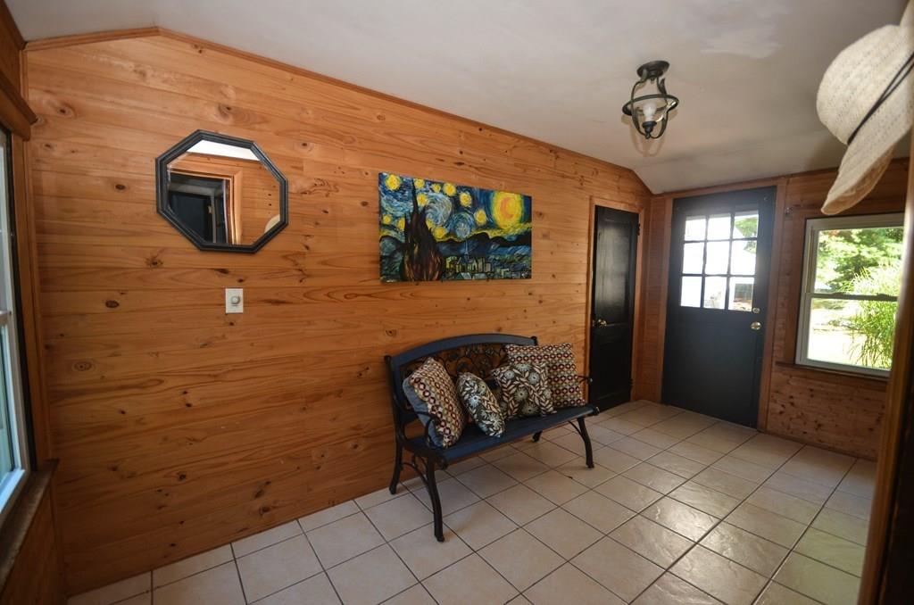 785 Fowler Road Northbridge, MA 01534 - Photo 3 of 28 a bedroom with a bed and a mirror