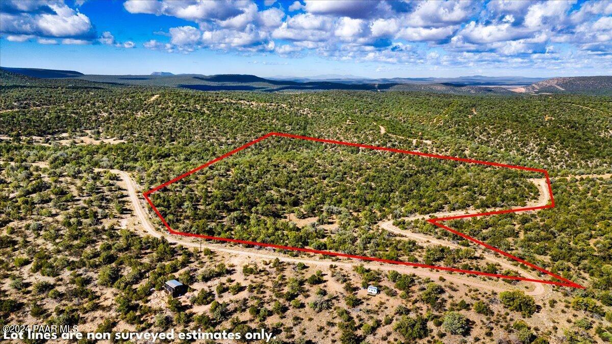 1399 North Thunder Ridge Ranch Road Ash Fork, AZ 86320 - Photo 2 of 10 a view of a yard