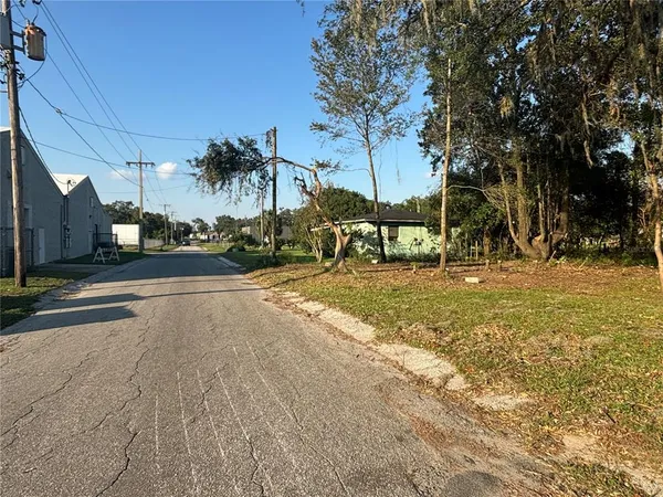 a view of a street with houses