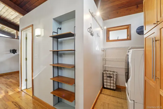 a bathroom with a sink a toilet and shower curtain