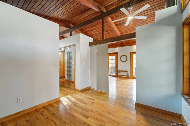 a room with gym equipment and a window