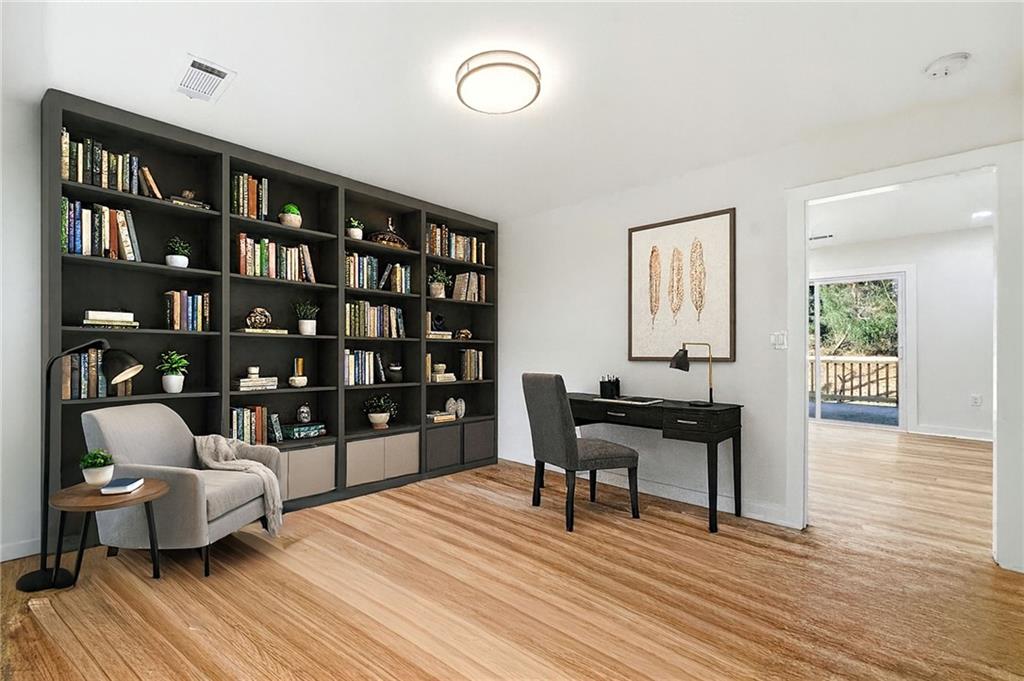 1136 Powell Court Southeast Atlanta, GA 30316 - Photo 12 of 33 a work room with furniture and wooden floor