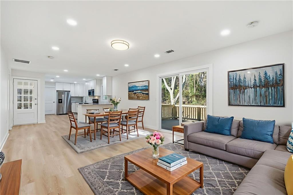 1136 Powell Court Southeast Atlanta, GA 30316 - Photo 5 of 33 a living room with furniture and a window