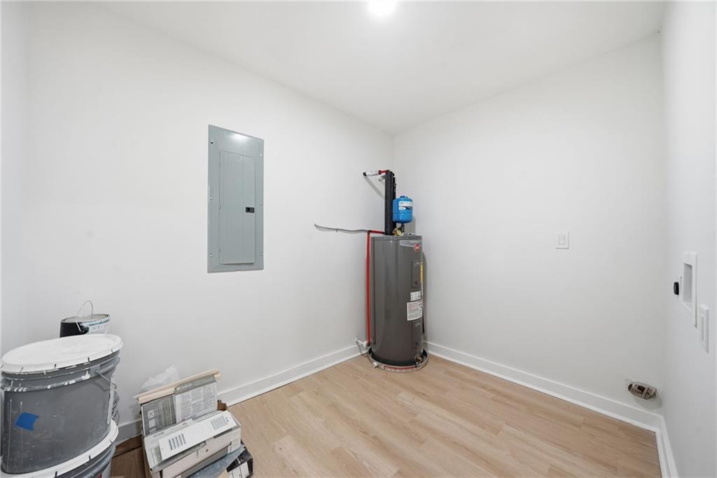 1136 Powell Court Southeast Atlanta, GA 30316 - Photo 9 of 33 a view of a storage & utility room with a window