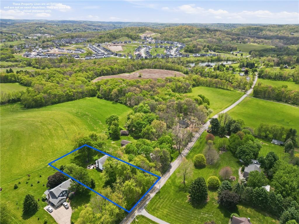 267 Forsythe Road Mars, PA 16046 - Photo 40 of 41 an aerial view of residential houses with outdoor space and swimming pool