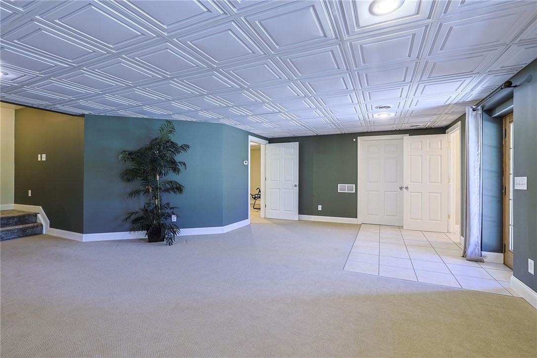 3681 Wilmington Road Lebanon, OH 45036 - Photo 46 of 87 This finished basement offers ample space and distinct flooring zones for versatile living.