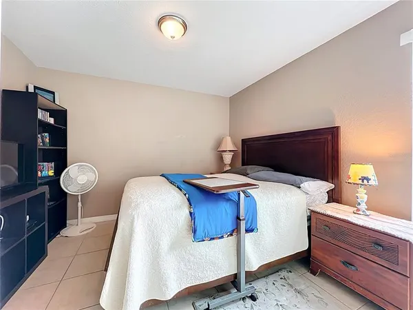 a bed room with a bed and furniture