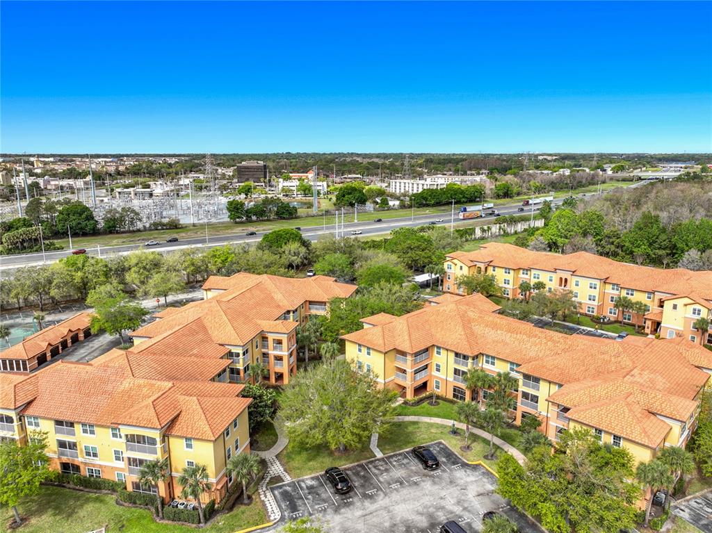 5471 Vineland Road, Unit 7109 Orlando, FL 32811 - Photo 45 of 60 an aerial view of lake and city