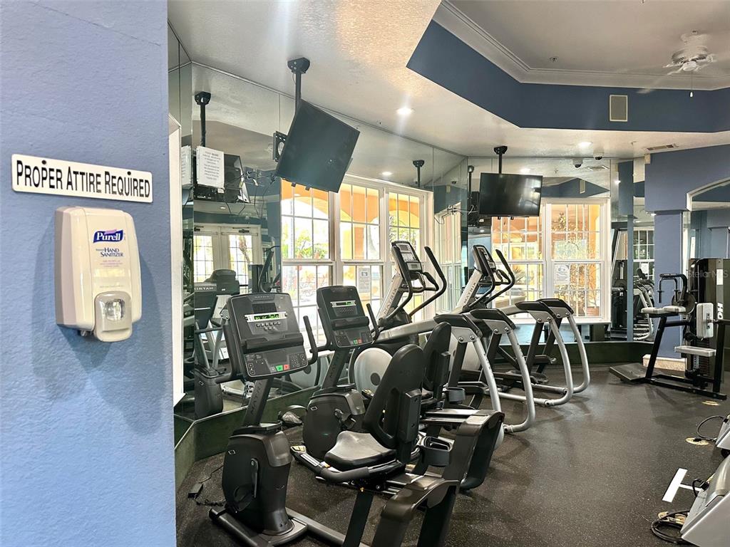 5471 Vineland Road, Unit 7109 Orlando, FL 32811 - Photo 53 of 60 a view of a room with gym equipment