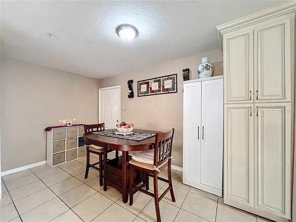 a kitchen with stainless steel appliances granite countertop a stove and a refrigerator