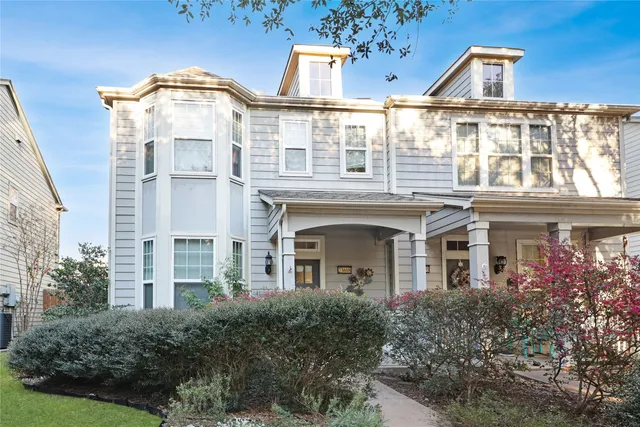 an aerial view of residential building with parking space