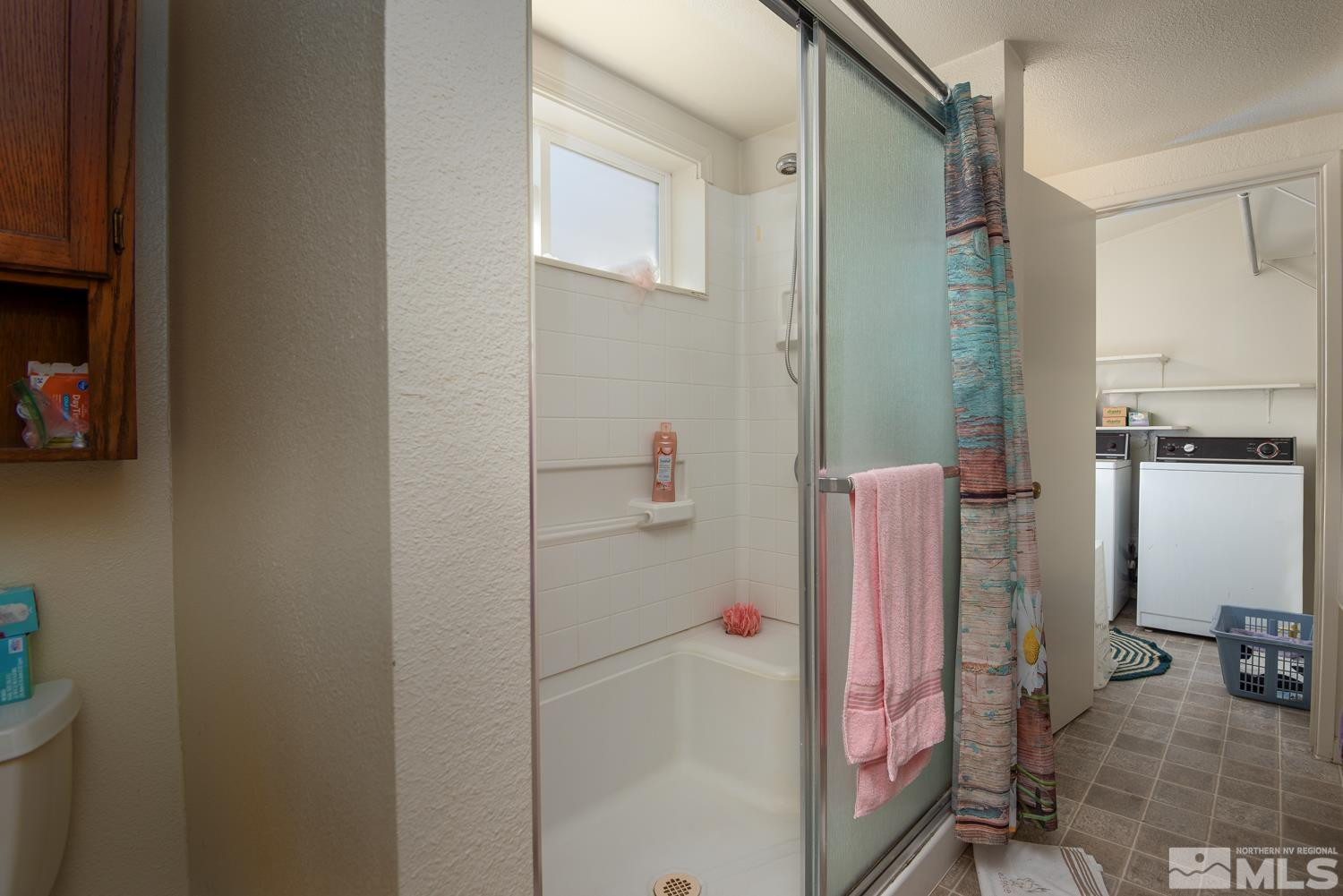 4240 Kings Canyon Road Carson City, NV 89703 - Photo 18 of 25 a bathroom with a shower