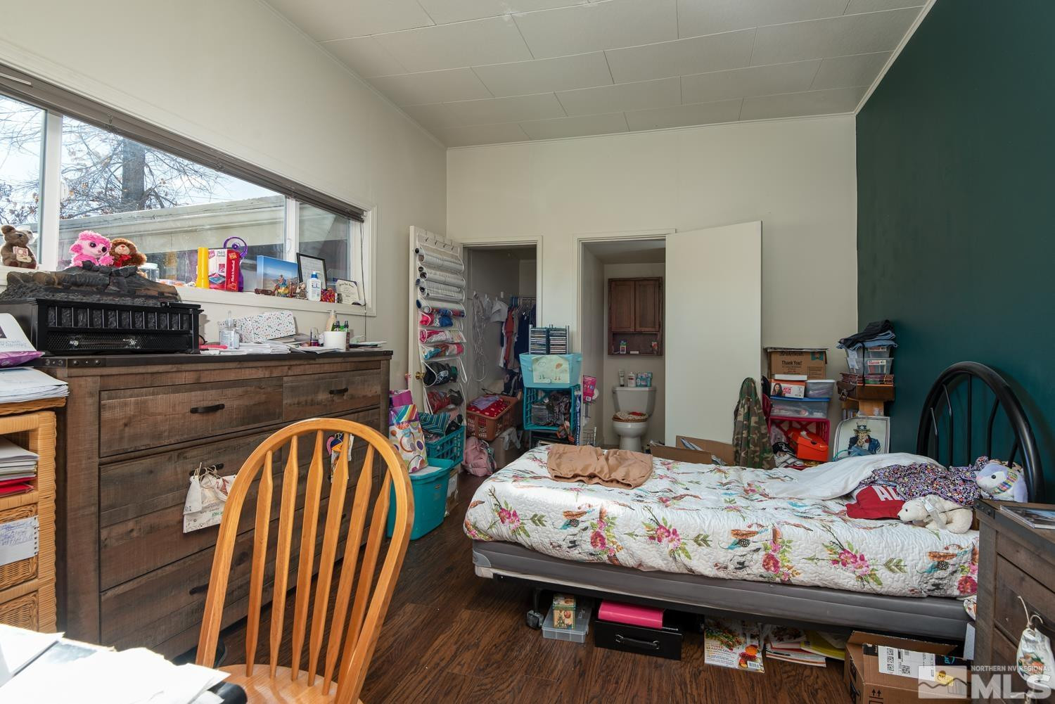 4240 Kings Canyon Road Carson City, NV 89703 - Photo 19 of 25 a living room with furniture fireplace and a flat screen tv
