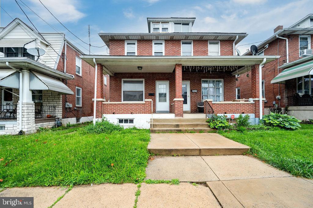 3523 Ridgeway Street Reading, PA 19605 - Photo 20 of 23 a front view of a brick house with a yard