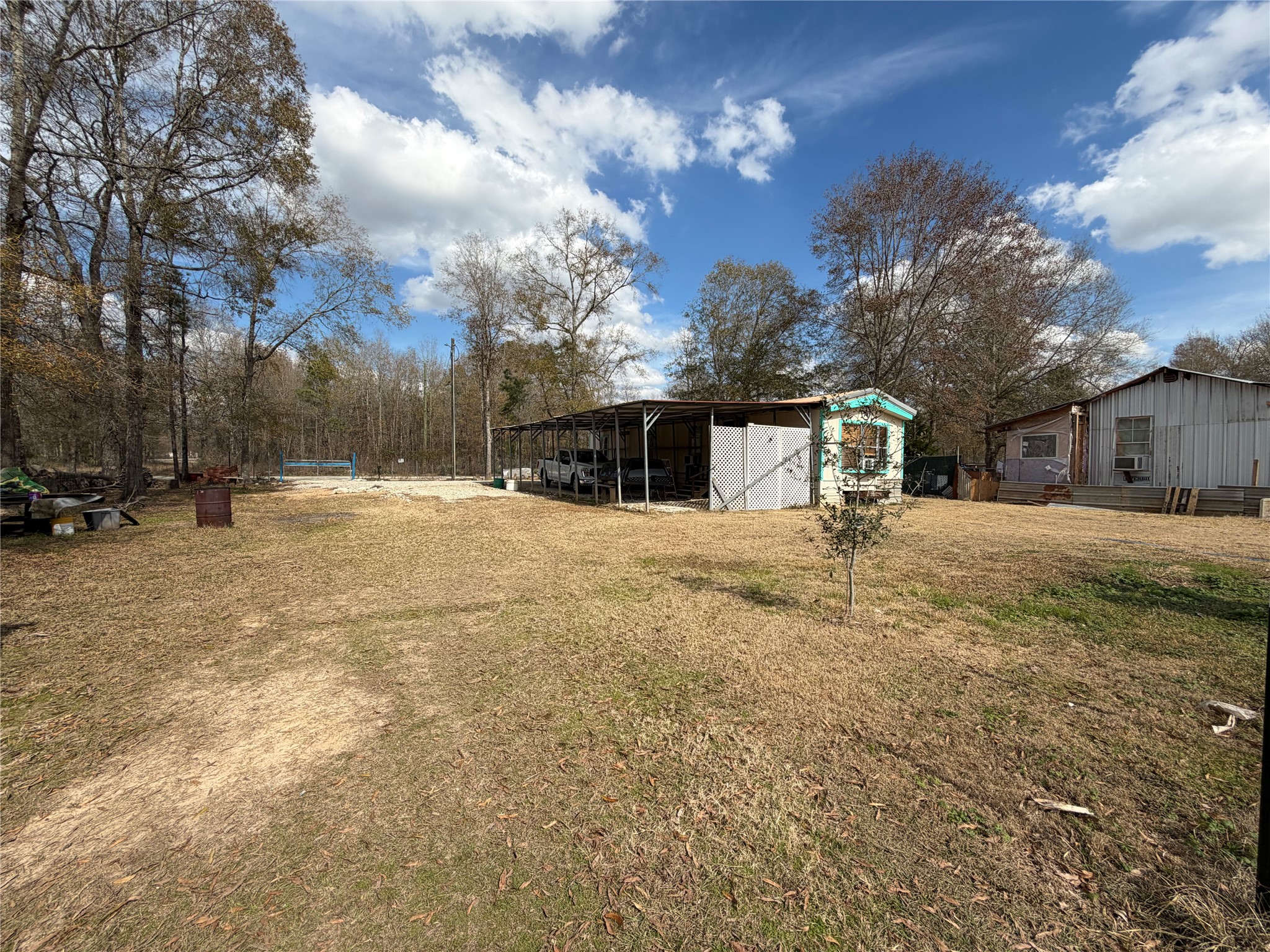 11 June Lane Shepherd, TX 77371 - Photo 16 of 33 a view of a yard with a house