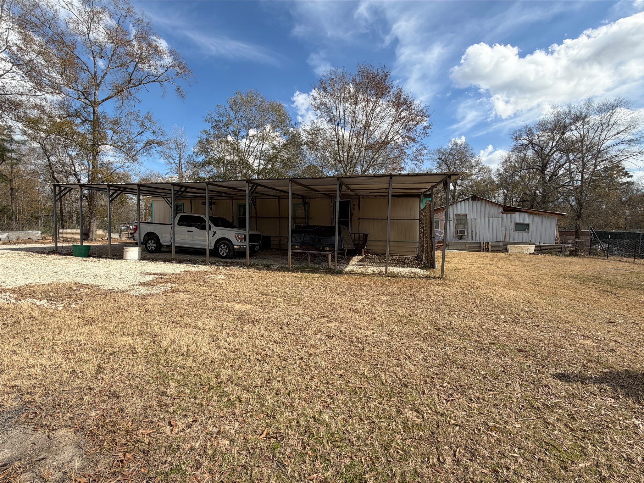 11 June Lane Shepherd, TX 77371 - Photo 17 of 33 a row of the house with outdoor space