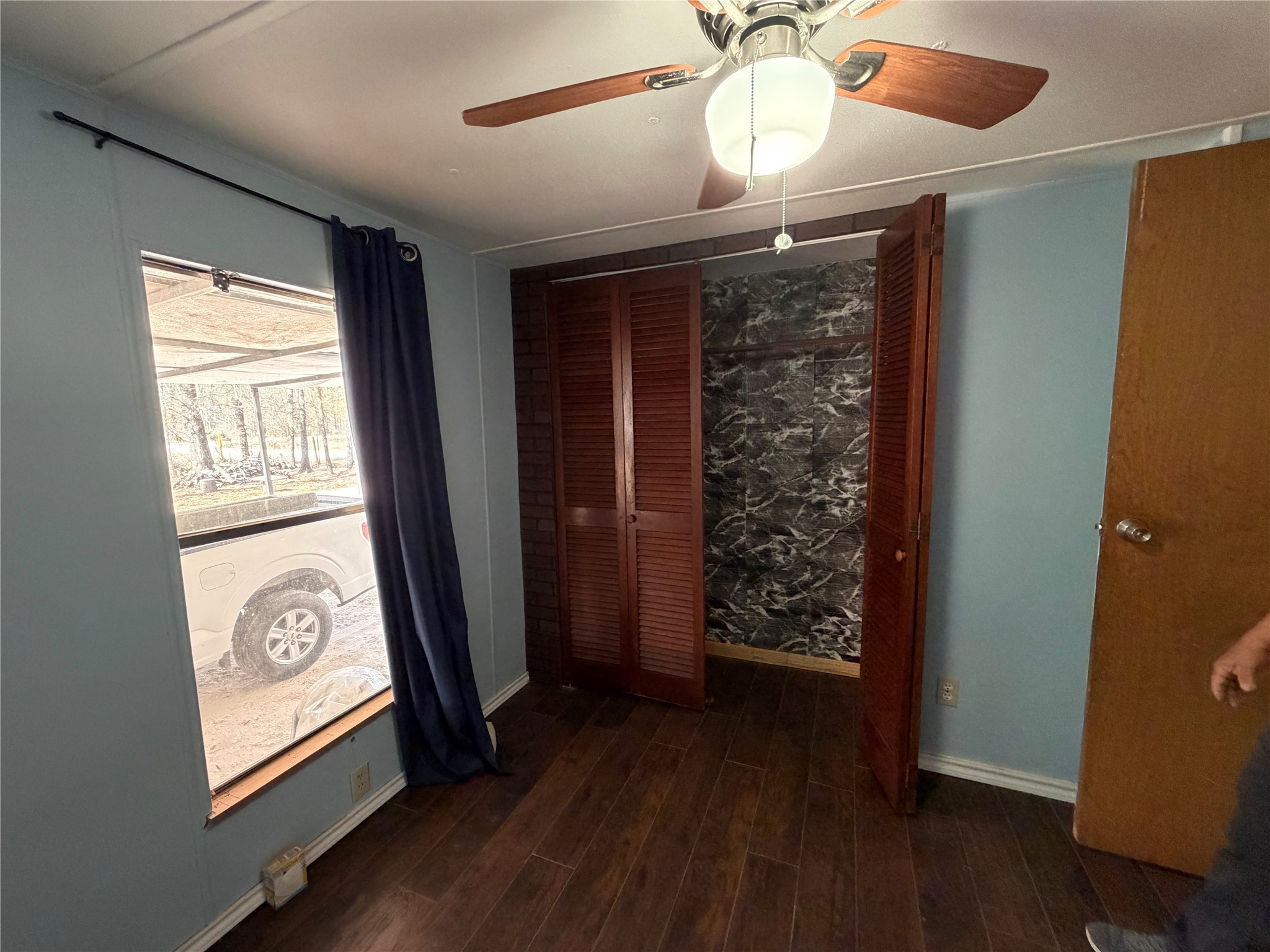 11 June Lane Shepherd, TX 77371 - Photo 21 of 33 wooden floor in an empty room with a window