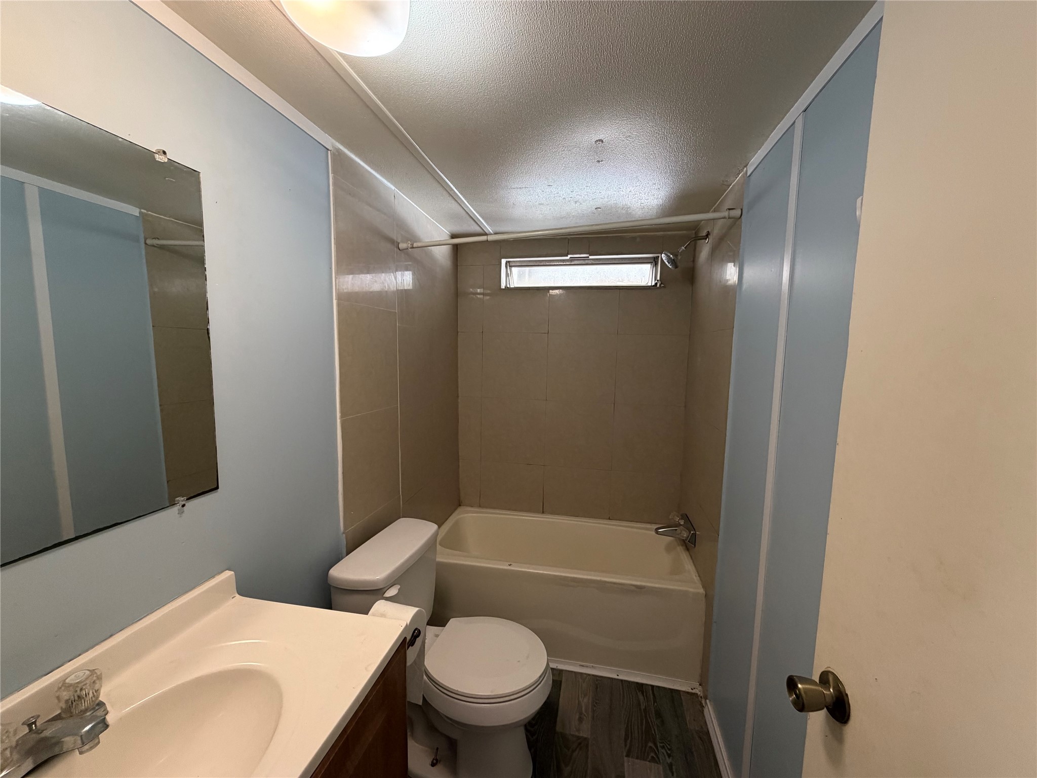 11 June Lane Shepherd, TX 77371 - Photo 25 of 33 a bathroom with a granite countertop toilet sink and shower