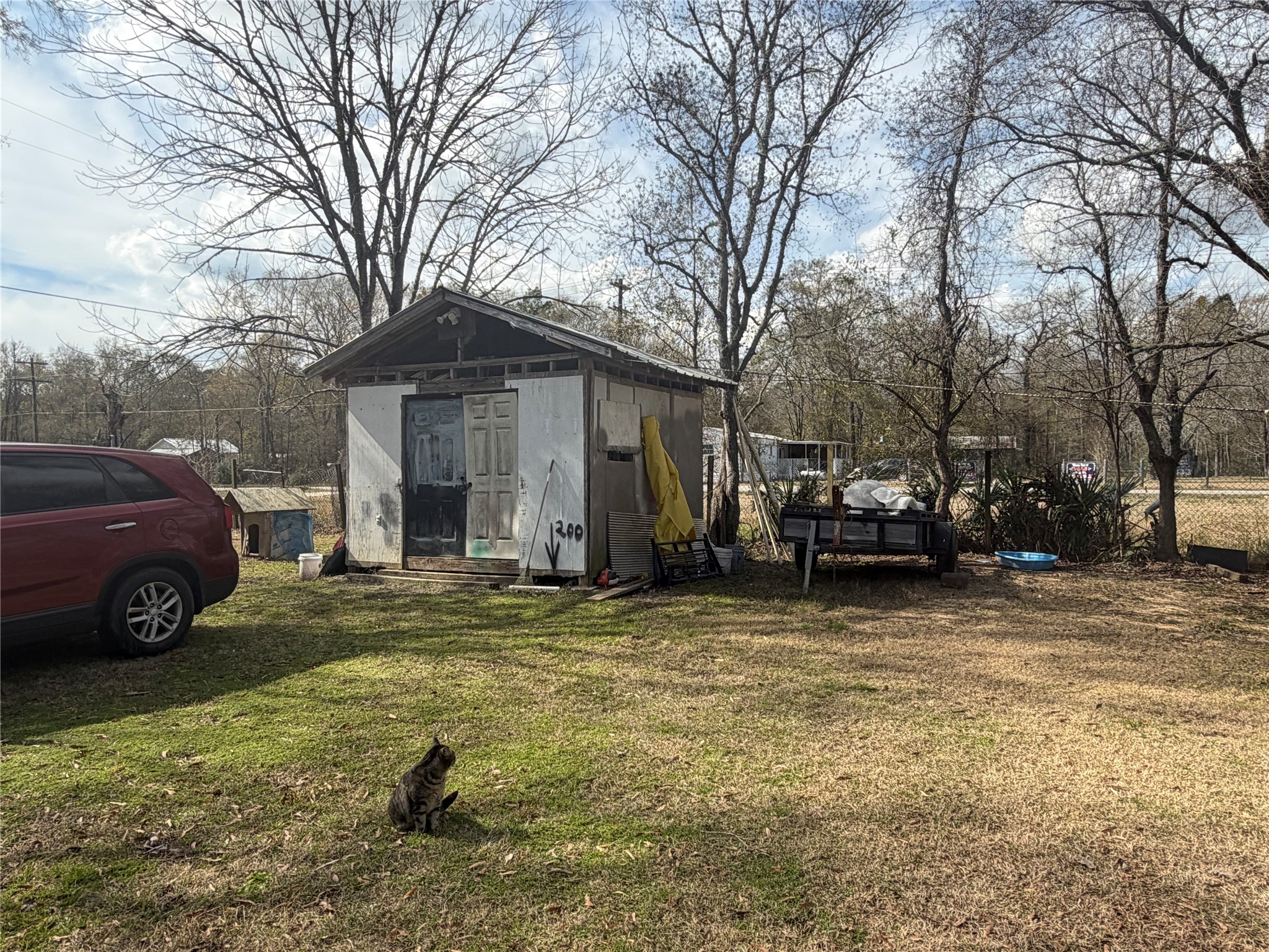 11 June Lane Shepherd, TX 77371 - Photo 5 of 33 a view of a house with a yard