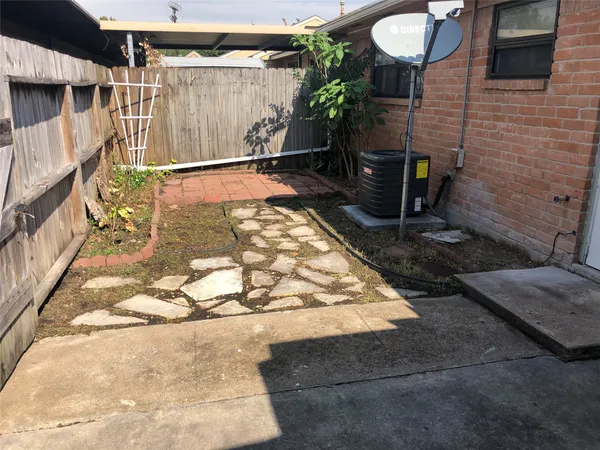 a view of a backyard of a house