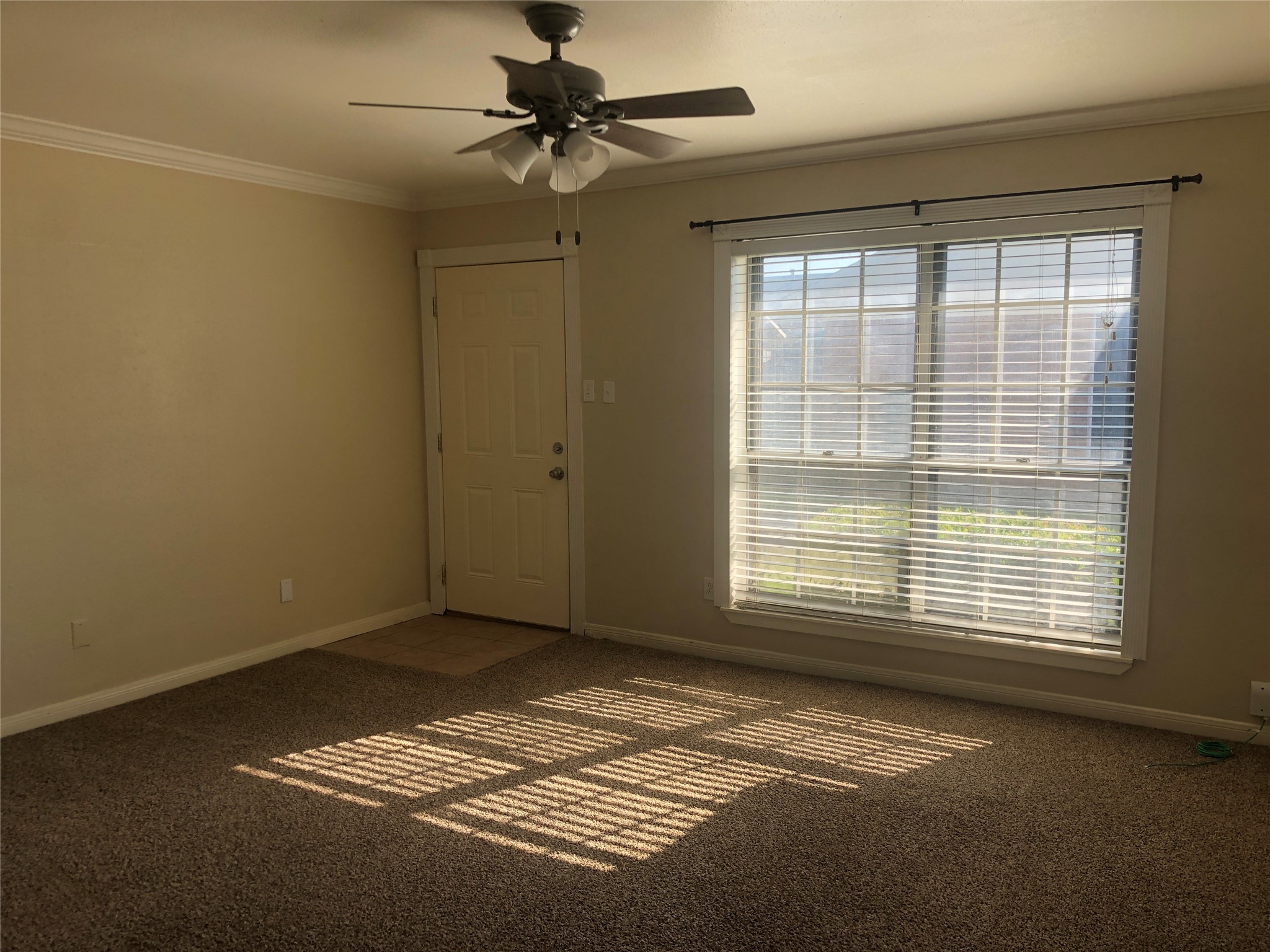 3332 Burke Road, Unit 83 Pasadena, TX 77504 - Photo 7 of 11 a view of an empty room with a window