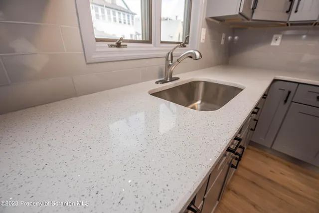 a close view of sink and mirror