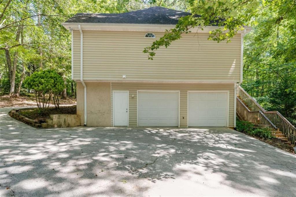 2219 Harper Drive Villa Rica, GA 30180 - Photo 25 of 25 a view of a house with a garage