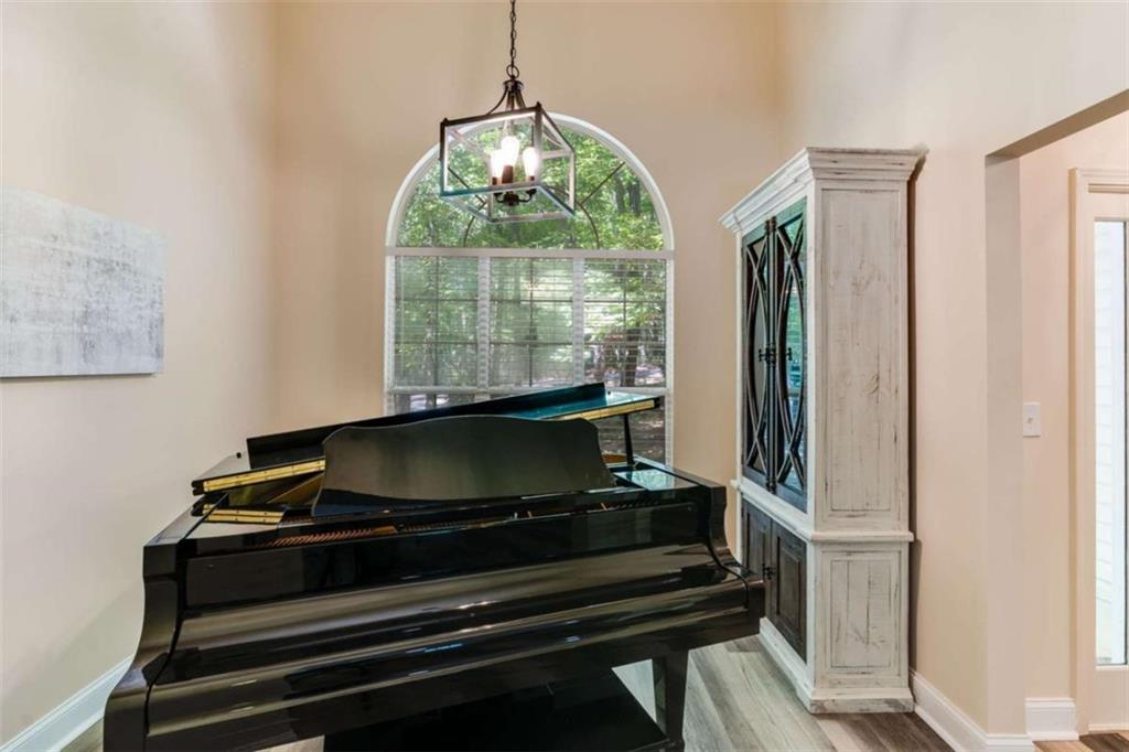 2219 Harper Drive Villa Rica, GA 30180 - Photo 6 of 25 a living room with furniture and a fireplace